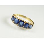An 18ct gold Victorian five stone sapphire ring,