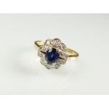 A sapphire and diamond cluster ring,