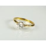 An 18ct gold single stone diamond ring,