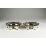 A pair of George III silver mounted wine coasters, S C Younge & Co, Sheffield 1813,