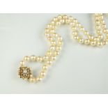 A uniform cultured pearl opera necklace, comprising seventy-two cultured pearls,