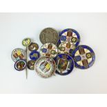 A collection of enamel coins and brooches, comprising; two double florins, dated 1887 and 1888,