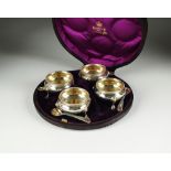 A cased set of four Victorian silver cauldron salts, Robert Harper, London 1875 & 1877,