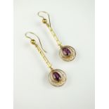 A pair of late 19th century almandine garnet ear pendants,
