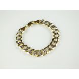 A yellow and white gold decorative curb link bracelet, with lobster claw clasp, 20cm long,