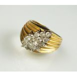 A diamond set dress ring,