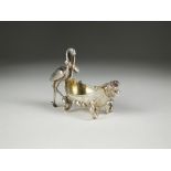 A continental novelty silver salt, designed a cradle mounted with a stork carrying a baby, 6cm high,