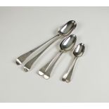 A harlequin part set of silver Old English pattern spoons, comprising; two basting spoons,