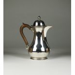 A silver hot water jug, Robinson & Co, London 1910,