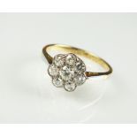 A diamond floral cluster ring,