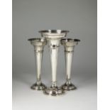 A garniture of three silver mounted posy vases, Walker & Hall, Sheffield 1925 & 1926,
