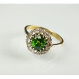 A demantoid garnet and diamond cluster ring,