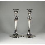 A pair of Old Sheffield plate candlesticks,