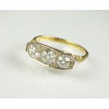 A graduated three stone diamond ring,