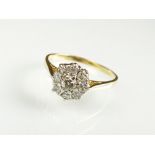 A diamond floral cluster ring,