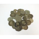 An assorted collection of British and Foreign silver, cupro-nickel, copper and bronze coinage,