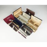 A collection of fourteen Sheaffer fountain pens, to include; two silver Imperial examples,