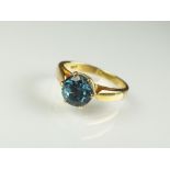 A single stone blue topaz dress ring,