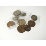 A collection of twenty-eight Roman and Greek bronze coins, to include; Augustus, Julius Caesar,