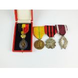 Four Belgium medals with attached ribbons (4)