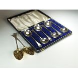 A cased set of six silver soup spoons, Cooper Brothers & Sons, Sheffield 1932,