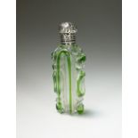 A white metal mounted glass perfume bottle,