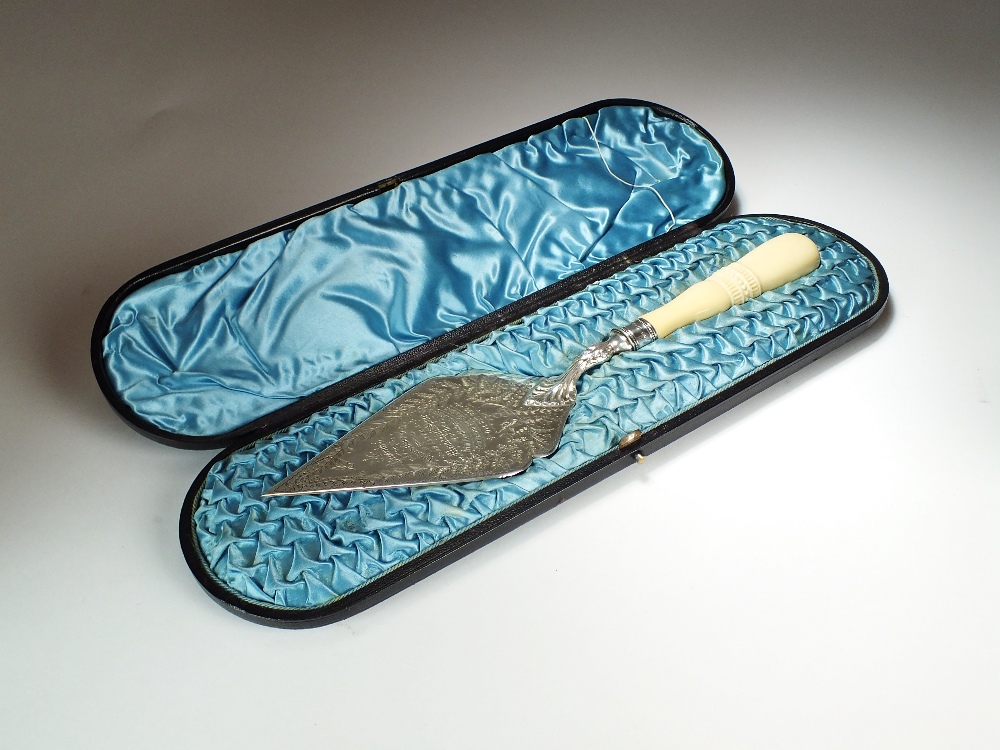 A cased Victorian silver presentation trowel, John Edward Bingham for Walker & Hall, Sheffield 1883,