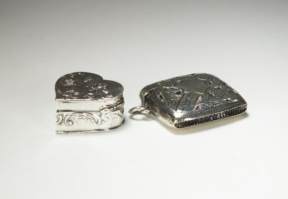 A Victorian silver heart shaped pill box, Samuel Boyce Landeck, import mark for Sheffield 1900,