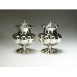 A pair of Victorian silver pepper pots, makers mark rubbed, London 1851,