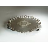 A silver presentation salver, Walker & Hall, Sheffield 1915, of circular from with pie crust rim,