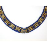 A 'President' chain of office, the material ribbon with attached twenty-seven triple clasps,