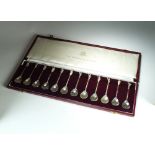 A cased set of twelve silver commemorative spoons, Birmingham Mint, London 1978 & 79,