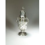 A Victorian silver sugar caster, William Comyns, London 1893,