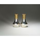 A Christopher Lawrence silver and gilt salt and pepper pot, London 1981,