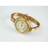 A lady's yellow metal cased wristwatch, stamped '14k',