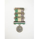 A silver hunger strike suffragette medal