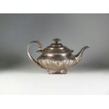 An early 19th century silver teapot