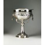 A silver pedestal rose bowl