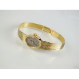 An 18ct gold Lady's Omega wristwatch