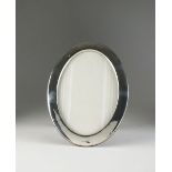 A silver oval frame