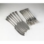 A set of silver fish knives and forks