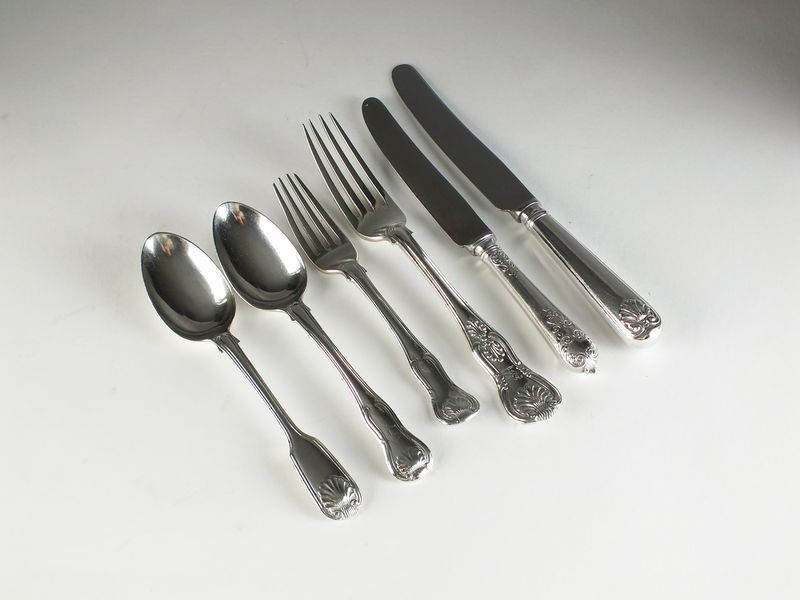 A harlequin set of silver flatware