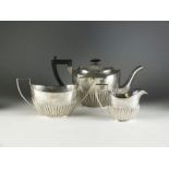 A three piece silver tea service