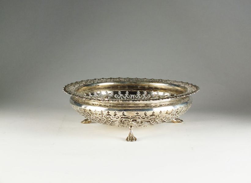 A pierced silver dish