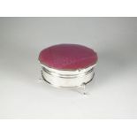 A silver and pink enamel trinket box