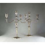 A pair of silver candelabra