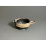 Greek, ceramic skyphos, 5th century BC; black glazed drinking cup with loop handles to the side