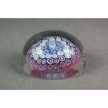 A French milliefori glass paperweight, 19 th century (scratched)