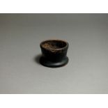 Greek, ceramic, 5th century BC, black glazed pyxis with rounded rim, short body and flared base