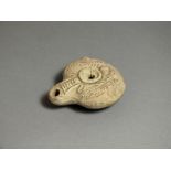 Late Romano-Egyptian, ceramic oil lamp, 4th - 5th century AD. Rounded nozzle with oval, cushion